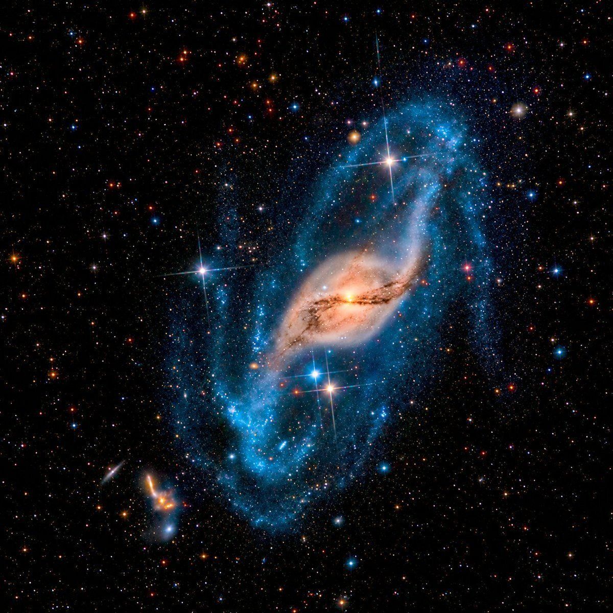 Sci_Nature0's tweet photo. 🌌 How Gravity Turned a Galaxy Into Cosmic Artwork: The Twisted NGC 3718 https://t.co/U2gd5rqqGK