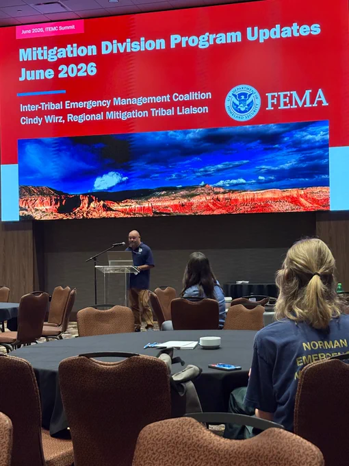 FEMA employee presenting Mitigation Division Program Updates for June 2026 at the Inter-Tribal Emergency Management Coalition's annual conference in Tulsa, OK with attendees seated.