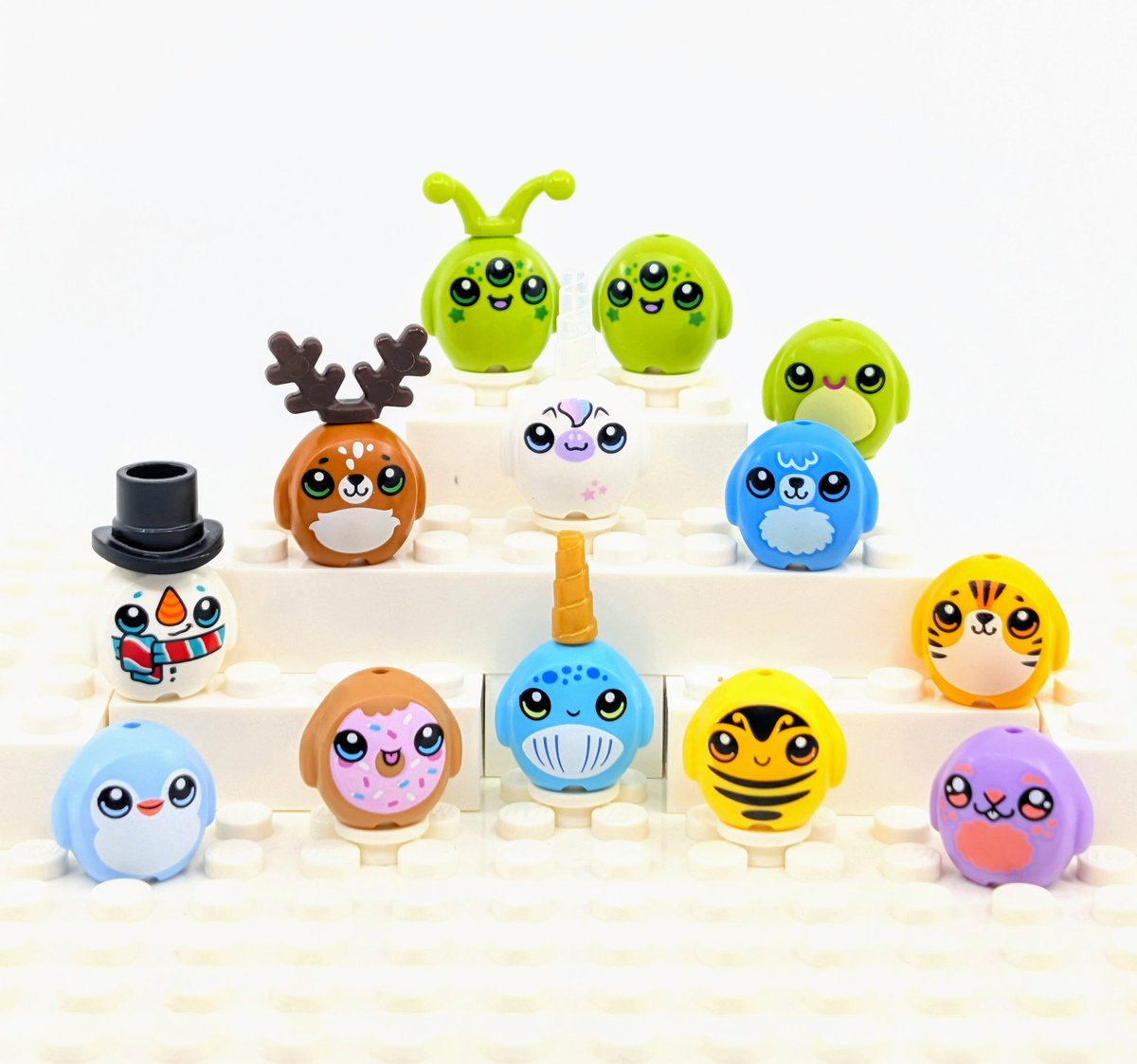 BricksFanz's tweet photo. Three new LEGO 'plushies' join the gang. You can find the Donut, Narwhal and Bee in LEGO Friends set 42700: Candy & Cupcake Ferris Wheel #LEGO #LEGOPlushies #LEGOCollectables #ActivitySupport26 https://t.co/5YkBQFZw8o
