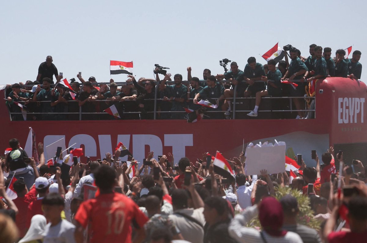 Gunner_811's tweet photo. Waving flags, singing patriotic songs and carrying banners proclaiming "Egypt's men made us proud", thousands of supporters welcomed Egypt's national football team home on Friday after the Pharaohs produced the finest World Cup campaign in the country's history.

Photos: Reuters https://t.co/rFqpBOWUlQ