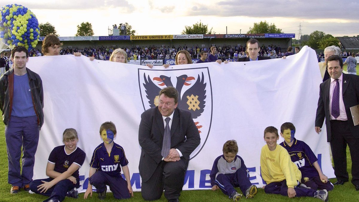 AFCWimbledon's tweet photo. On this day in 2002, AFC Wimbledon took to the field for our first match since fans took on ownership of our football club 💛💙

Few could've imagined the journey that we'd go on. Five promotions in nine years. A Football League return. Home to Plough Lane. We never give up 💪 https://t.co/fSGGcLQpj9