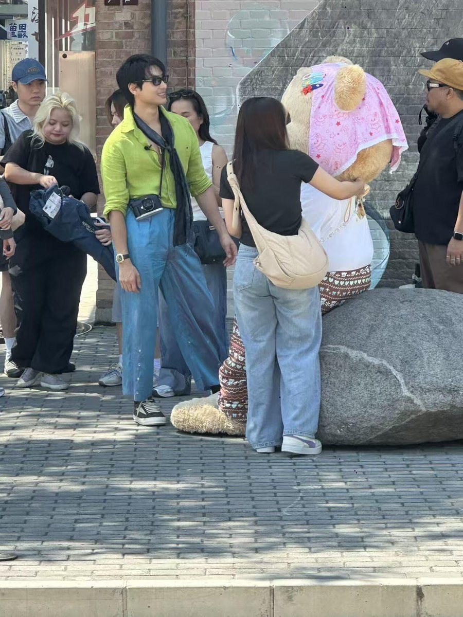 gambogetree's tweet photo. Nong rak is officially apo's obsession these days😂 four days of filming a secret project in beijing and nanjing, and he's been wearing nong rak outfits loud and proud every single day💯 

((we're all itching to iron his shirt)) https://t.co/s4GCKo5P0K