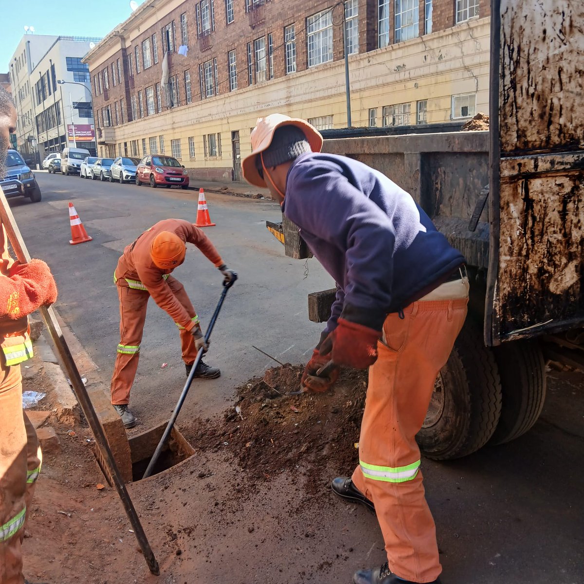 MyJRA's tweet photo. Inner-city road maintenance and infrastructure repairs are underway on various streets in Hillbrow, Marshalltown, and New Doornfontein. @CityofJoburgZA @RegionF_Joburg https://t.co/Amseu0xt5o
