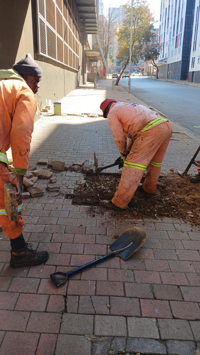 MyJRA's tweet photo. Inner-city road maintenance and infrastructure repairs are underway on various streets in Hillbrow, Marshalltown, and New Doornfontein. @CityofJoburgZA @RegionF_Joburg https://t.co/Amseu0xt5o