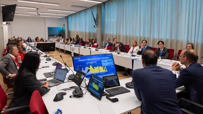 WIPO Assemblies participants attend a meeting in a conference room at WIPO Headquarters in Geneva, Switzerland.

