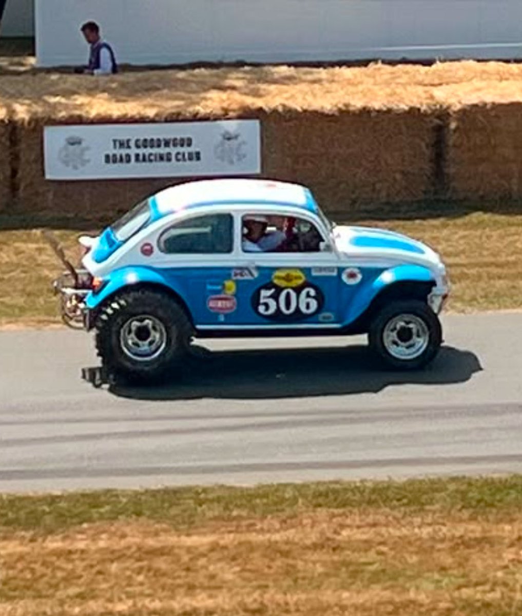 TamiyaUK's tweet photo. Only at @fosgoodwood can you get Tamiya President Nobuhiro Tamiya to ride in a full size Lanzante built Sand Scorcher… driven by Mad Mike! https://t.co/TnfV7gQbbM