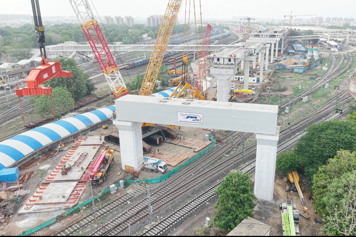 RailMinIndia's tweet photo. Engineering excellence in action! 
The successful launch of all 13 heavy portal beams in Ahmedabad marks a significant step forward for India's first high-speed rail project.
#BulletTrain #ViksitBharat #RailInfra4India https://t.co/Vuz3K6hGcW