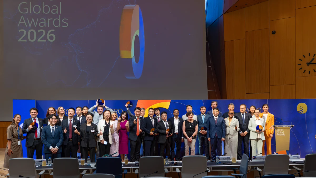 Group photo of representatives of the winners of the 2026 WIPO Global Awards, jury members, WIPO Director General Daren Tang, and members of the WIPO Global Awards team at the WIPO Conference Hall during the WIPO Assemblies. Behind them is the WIPO Global Awards 2026 branding.