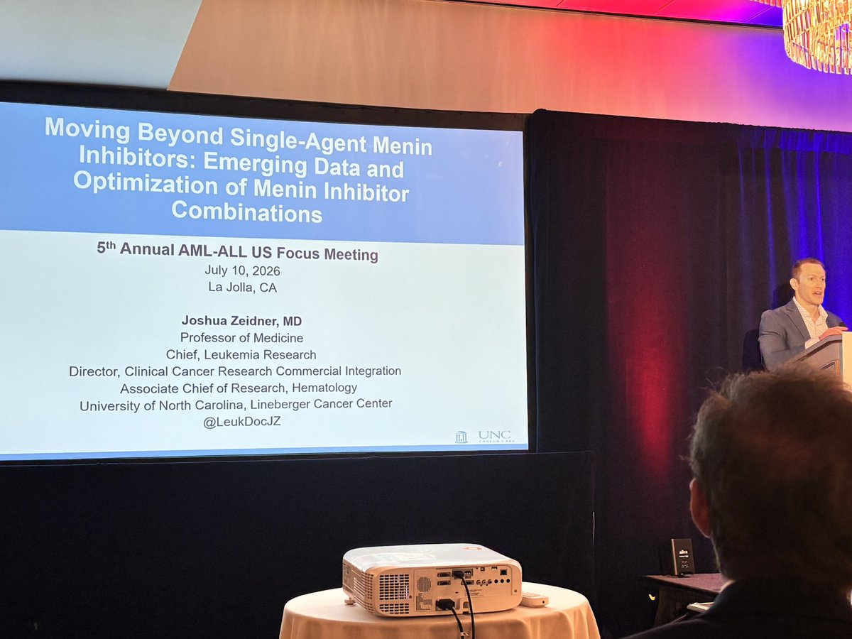 DPetersMD's tweet photo. One of the many great talks at @_MDEducation  AML-ALL focus group. @LeukDocJZ  of @UNC_Lineberger showing continued, impressive results of Menin-I 💊in NPM1 and KMT2Ar AML and emphasis on frontline combos. Tip of the iceberg!🧊 #leusm https://t.co/GMbx7Avnxi
