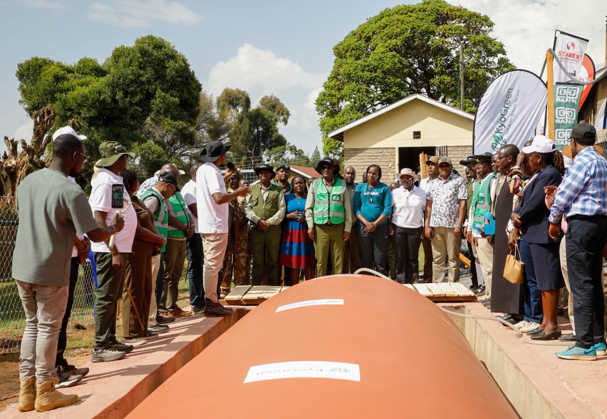 KeForestService's tweet photo. KFS Champions Biogas as a Sustainable Alternative to Firewood

The Kenya Forest Service (KFS) continues to champion clean energy solutions as a key strategy for reducing pressure on forests, minimizing reliance on firewood, and advancing sustainable environmental conservation.

Today, @CCF_Kenya, Mr. Alex Lemarkoko joined the Head of Public Service, @koske_felix, alongside government leaders, development partners and other stakeholders at St. Agatha Mokwo Girls Secondary School for the commissioning of a new 50-cubic-metre biogas plant.

The newly commissioned facility complements the school's existing 30-cubic-metre biogas plant and bakery, both established by the Kenya Forest Service under the Green Zones Development Support Project (GZDSP) Phase I. Together, the two biogas plants will substantially enhance the school's clean energy capacity, reducing dependence on firewood, lowering operational costs, improving the learning environment, and contributing to climate change mitigation through reduced carbon emissions.

Beyond promoting clean energy, KFS has invested in the institution through the construction of a modern biochemistry laboratory to strengthen science education and research. The Service has also supported tree growing and riparian restoration along the river bordering the school, helping protect water catchment areas, restore degraded ecosystems, and improve environmental sustainability.

The integrated interventions reflect KFS's holistic approach to conservation by combining ecosystem restoration, renewable energy, education, and community development. They also support the Government's broader agenda of increasing national tree cover, promoting sustainable livelihoods, and building climate-resilient institutions.

The event was also attended by KFS Board Chairperson Mr. Titus Korir, senior Kenya Forest Service officers, national and county government officials, and members of the local community, underscoring the importance of multi-stakeholder partnerships in advancing sustainable forest conservation and clean energy initiatives.