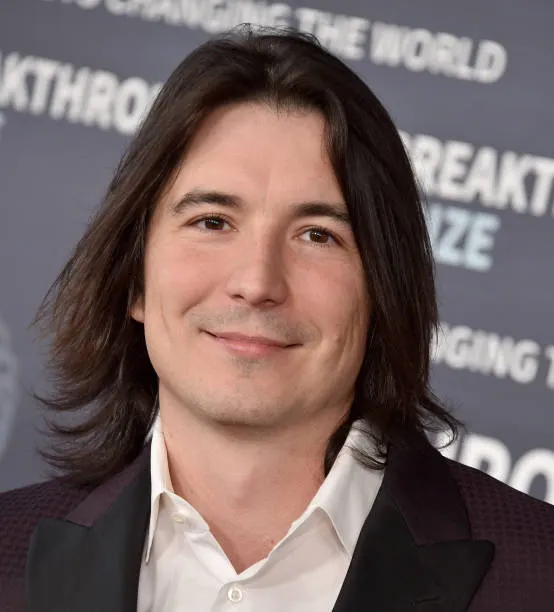 Param_eth's tweet photo. The Story of Vlad Tenev (Robinhood):

- Born in 1987, Bulgaria 🇧🇬

- Moves to the U.S. at age 5

- Grows up in Northern Virginia

- Attends Thomas Jefferson High School for Science & Technology

- Studies Mathematics at Stanford

- Meets future co-founder Baiju Bhatt

- Earns a Master's in Mathematics from UCLA

- Drops out of a PhD to build startups

Early career:

- Co-founds Celeris

- Builds high-frequency trading software

- Later starts Chronos Research

- Notices institutions trade almost for free

- Retail investors pay the highest fees

2013:

- Co-founds Robinhood

- Launches commission-free stock trading

- Challenges the traditional brokerage industry

2021:

- Robinhood goes public

- Leads the company through the GameStop saga

- Becomes one of fintech's most recognizable CEOs

2023:

- Co-founds Harmonic AI

- Focuses on mathematical superintelligence

- Company reaches a $1B+ valuation

2026:

- Expands Robinhood beyond stocks

- Crypto

- Banking

- Launches Robinhood Chain

- Brings tokenised stocks and RWAs onchain