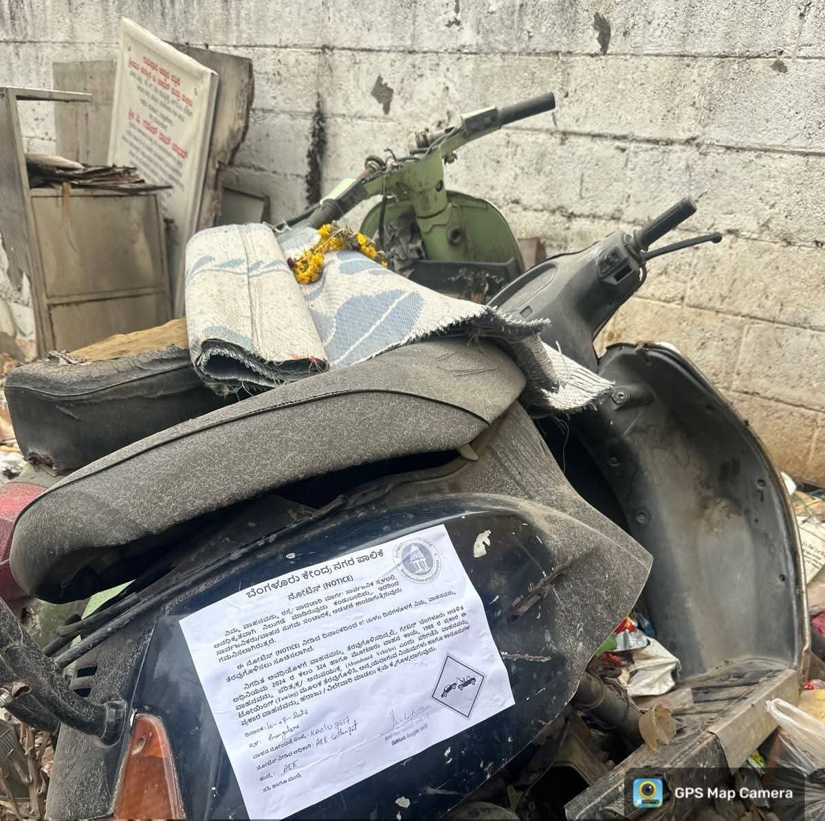 GBA_office's tweet photo. 🚗 Notice Issued to Abandoned Vehicles in Public Spaces

As part of the abandoned vehicle clearance drive, notices have been affixed to ownerless and abandoned vehicles parked in public spaces within the Cottonpet Sub-Division of the Bengaluru Central City Corporation.

If the vehicles are not removed within the time specified in the notice, further action will be taken in accordance with the rules.

#DKShivakumar #Karnataka #Bengaluru #KBG #towing #GreaterBengaluruAuthority