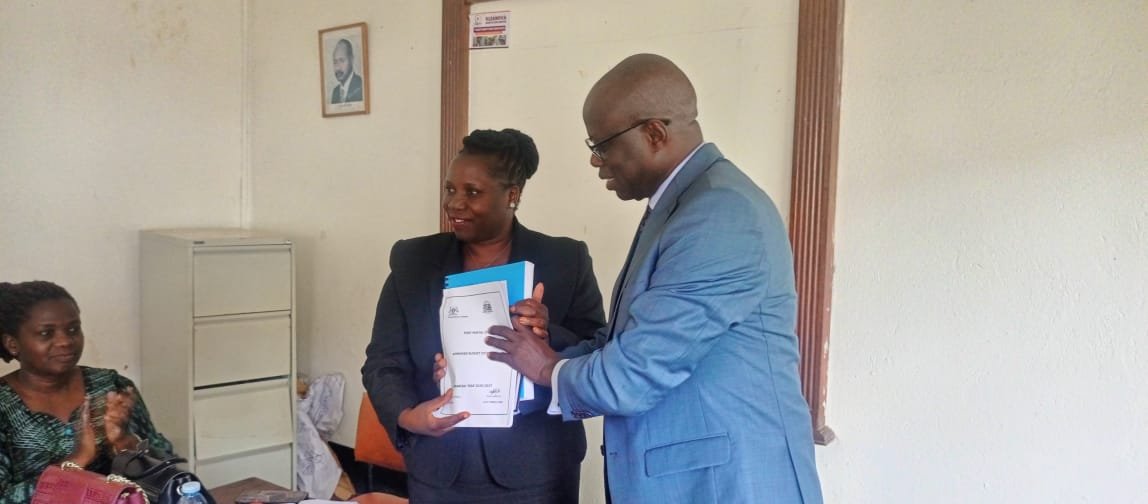 fortportal_city's tweet photo. Outgoing Fort Portal Town Clerk Praised for Resolving Conflict and Doubling Local Revenue.

The outgoing Fort Portal Tourism City Town Clerk, Mr. Ocen Ambrose, has left behind a historical legacy of conflict resolution and financial growth, Deputy Mayor Hon. Margaret Kabajwara has observed. 

Representing the City Mayor at the official handover ceremony to the incoming Town Clerk Madam Akello Regina at the RCC's Boardroom, Hon. Kabajwara revealed that Mr. Ocen assumed office when Fort Portal was battling severe administrative friction. However, through his wisdom and professionalism, he successfully intervened and restored harmony to the city leadership.

The Resident City Commissioner (RCC), Madam Nasike Asumin, noted that while it is disheartening to witness handovers prompted by interdictions, Mr. Ocen’s departure is a celebratory milestone because he is leaving on promotion. 

She highly commended him for his swift administrative actions, particularly in recruiting key human resources. This strategic staffing directly resulted in a massive surge in local revenue, which doubled from 2 billion to 4.1 billion shillings. 

In his final handover report, Mr. Ocen urged his successor, Madam Akello Regina, to prioritize and support staff career growth and development. He also challenged the city technical team to remain focused and deeply committed to improving service delivery for the local population.

Upon receiving the instruments of power, Madam Akello expressed her gratitude to Mr. Ocen for his exemplary leadership, steadfast guidance, and dedication to mentoring staff.
She called for collectiveness ,responsibility and professionalism in execution of duties to build a city to a Model and sustainable enjoyed by everyone.
Mr. Ocen Ambrose joins Muni University as University Secretary.
