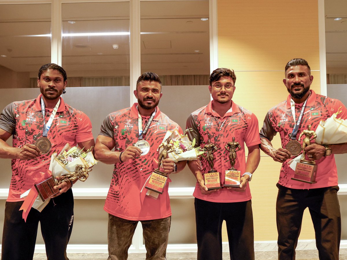 MoYSF_mv's tweet photo. State Minister Ibrahim Amir welcomed the Maldives National Bodybuilding Team upon their return from the 16th South Asian Bodybuilding and Physique Sports Championship 2026, held in Thimphu, Kingdom of Bhutan, from 30 June to 5 July 2026.

The Maldivian team delivered an outstanding performance on the regional stage, bringing home three medals:
🥇 Azneen Rashad – Gold Medal and South Asian Champion in the Men's Athletic Physique (Up to 167 cm + 4 kg) category.
🥈 Ahmed Naeem – Silver Medal in the Men's Sports Physique (Up to 170 cm - 2 kg) category.
🥈 Ali Mabrook Latheef – Silver Medal in the Men's Sports Physique (Up to 175 cm) category.