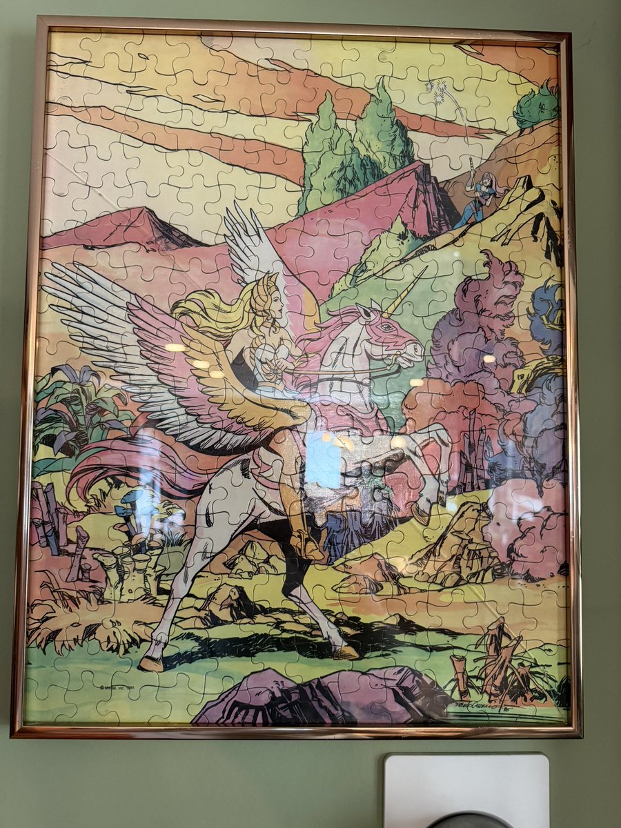 Toyhuntersholl2's tweet photo. Excellent addition to our art walls!
She-Ra puzzle that was framed in the 80s. 

It's a fantastic piece, during shipping it got cracked.....isn't the end of the world, you can barely tell it

The last pic is it hung up and I don't think it looks bad

#sheraprincessofpower #shera https://t.co/WVX2j6OepF