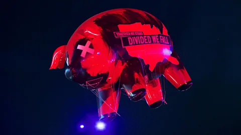 GrahamHill89142's tweet photo. @OwenShroyer1776 its literally a war pig balloon from a pink floyd concert you dipshit lmao. https://t.co/IH04JE8W4q