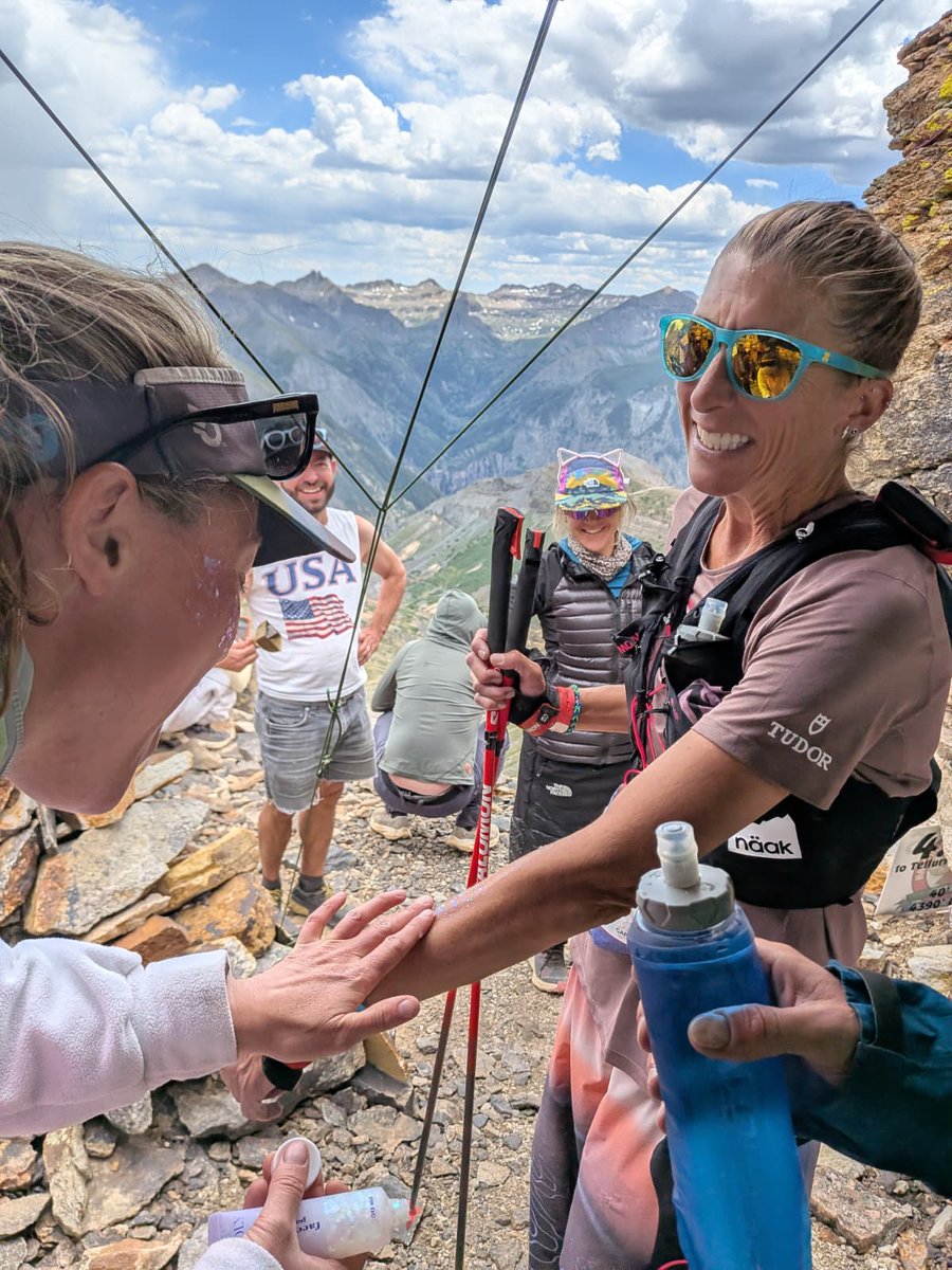 iRunFar's tweet photo. Courtney Dauwalter leads the women's field at Kroger's Canteen (mile 33) in 7:43 elapsed, aka 30 minutes up on record pace for this direction. She was her normal friendly self, asking how we were all doing, before getting glitter bombed and heading out. #HR100 https://t.co/fVmnc7aXCJ