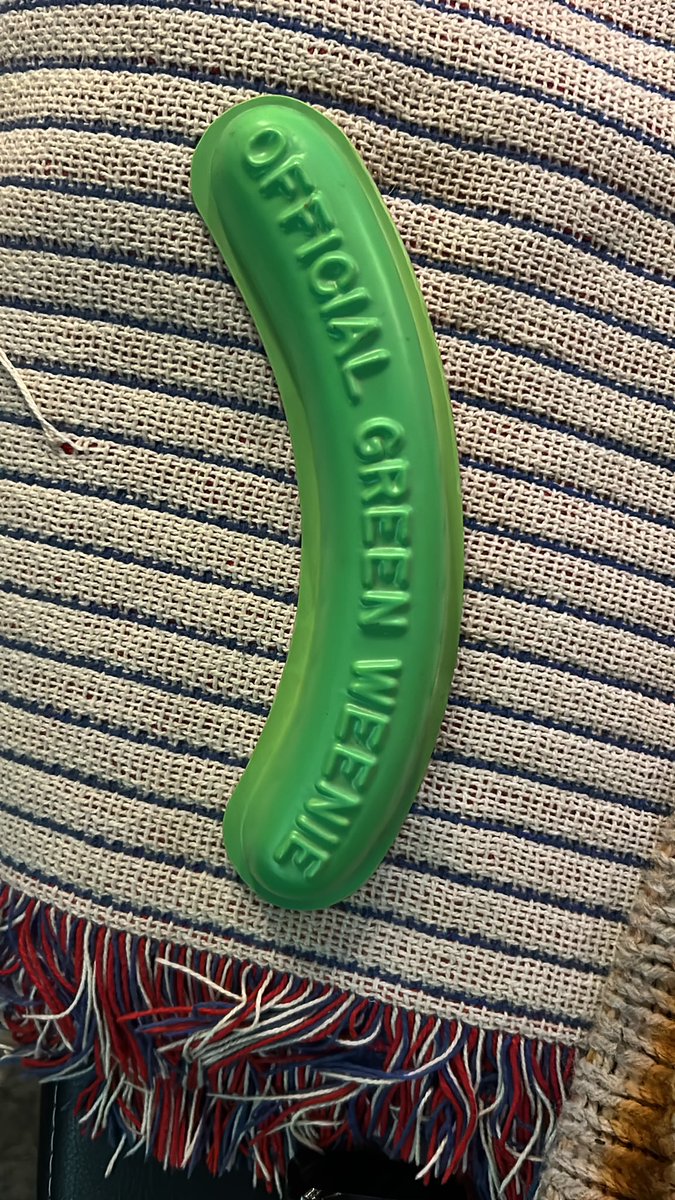 Wassdogg's tweet photo. @IntentionalTalk that pickle-looking thing being used by the Pirates broadcaster is an Official Green Weenie. It was originated by Pirates broadcaster Bob Prince many years ago, but as a way to jinx the opposing team. So it was being used incorrectly FYI. Instructions are below: https://t.co/sXE8pftrK4