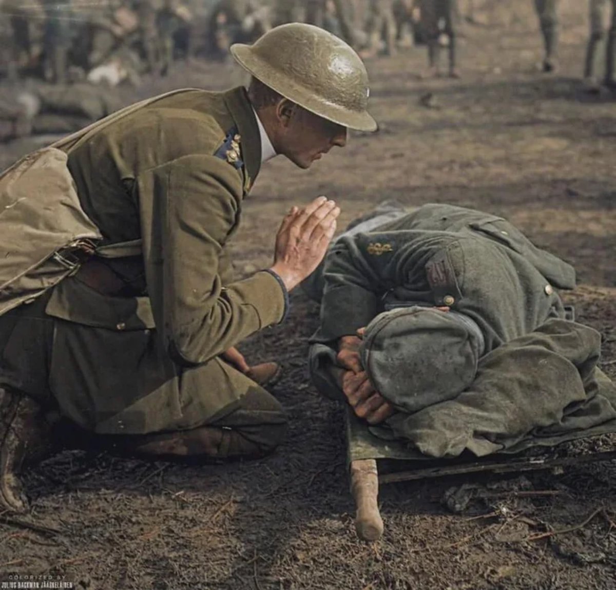 EchoesofEmpire_'s tweet photo. A British Army chaplain saying a prayer over a dying German Army medic near Epehy, France on the 18th September 1918. https://t.co/Ycg5SHuEKA