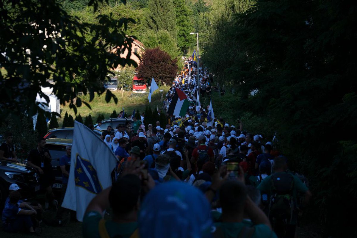 PCRCBiH's tweet photo. This evening, #SYS26 youth led by our founder and president Velma Šarić joined thousands of walkers on the final kilometers of the Peace March. 

This annual three-day trek is retracing the route taken by those who tried to escape Srebrenica in July 1995, walking through the forests of eastern Bosnia toward safety.

For our participants walking alongside survivors, families, and people from across the region wasn't just an act of solidarity: it was a chance to witness remembrance in motion. Along the way, they talked with fellow walkers, listened to their stories, and reflected on what it means to protect memory and work on prevention of atrocities. 

#PCRCBiH #SYS26 #Srebrenica31 #remembrance #youth