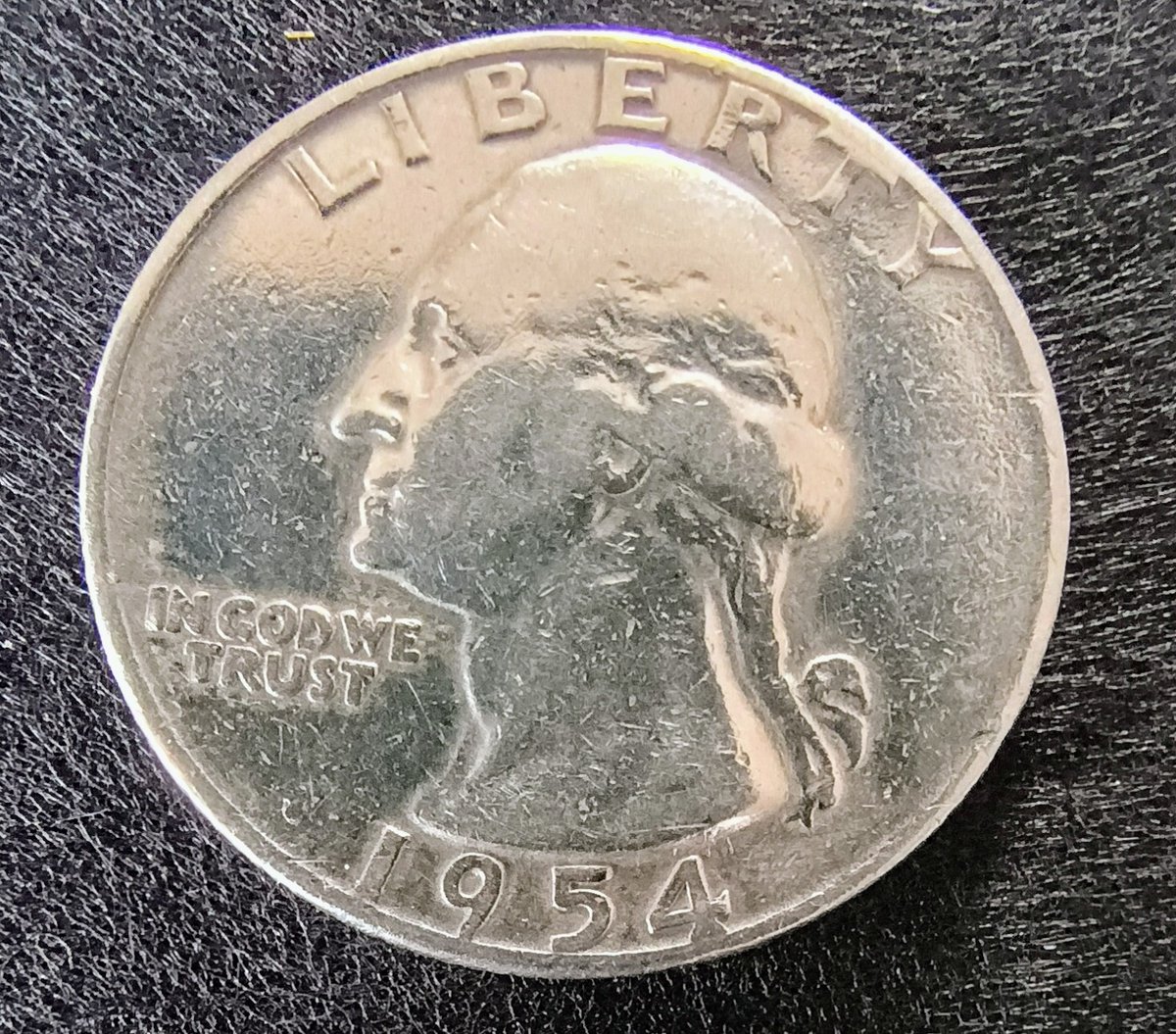 BJackson1001's tweet photo. Sitting pretty in my coin collection is this 1954 silver quarter from the Denver mint. https://t.co/dvGFBx2QrA