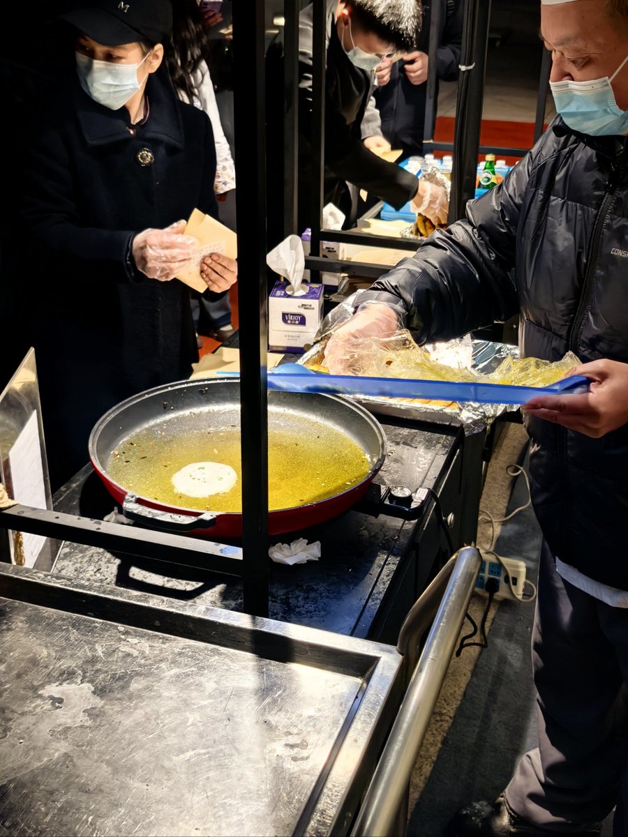 KLeiskau's tweet photo. Craving late-night vibes This crispy Chinese fried pancake you grabbed on the sidewalk hits different—hot, savory, and 100% street food gold! https://t.co/acnfOWWXNP