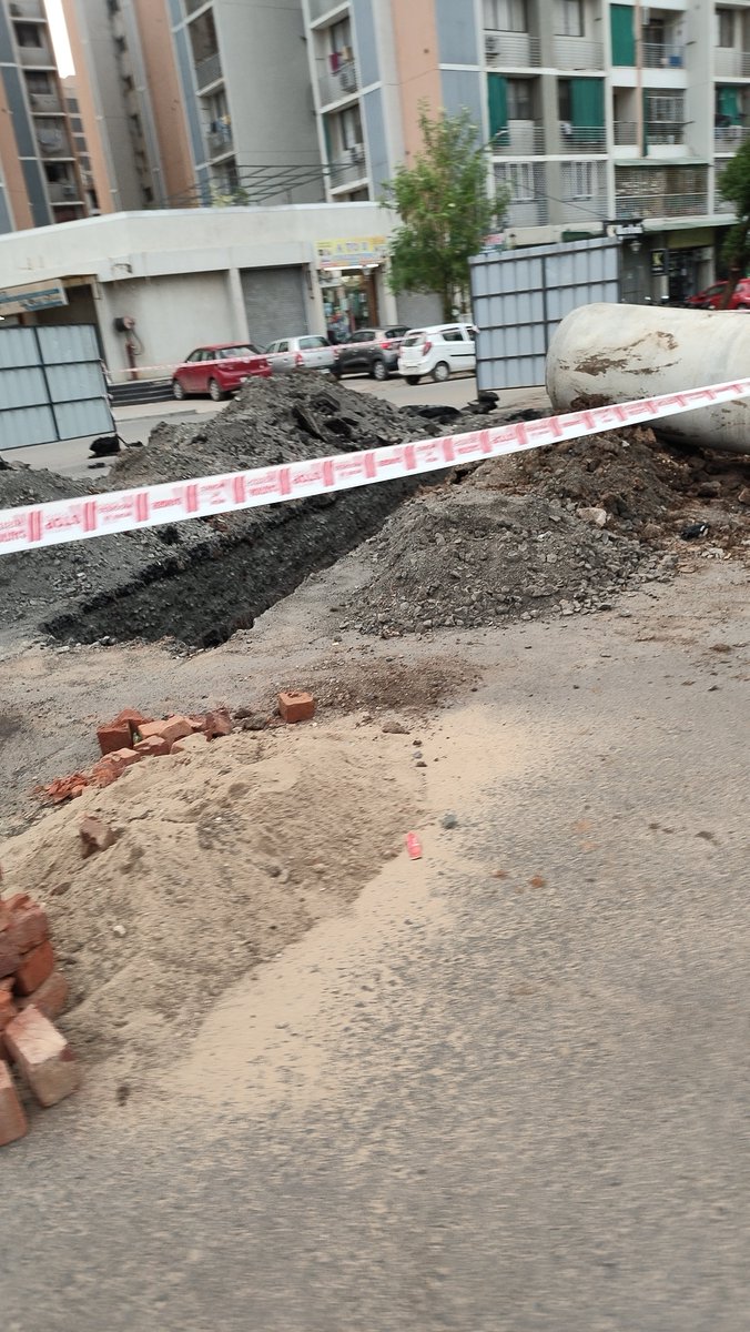 ngdarji's tweet photo. @AmdavadAMC @AMC_Complaints Just few months before the new road was made, now they realized about missing drainage link and digged, that too in monsoon. What type of road infra are you making? શરમ કરો હવે. Serenity Space, Gota. @Bhupendrapbjp @AmitShah https://t.co/Gdg49SY0kT
