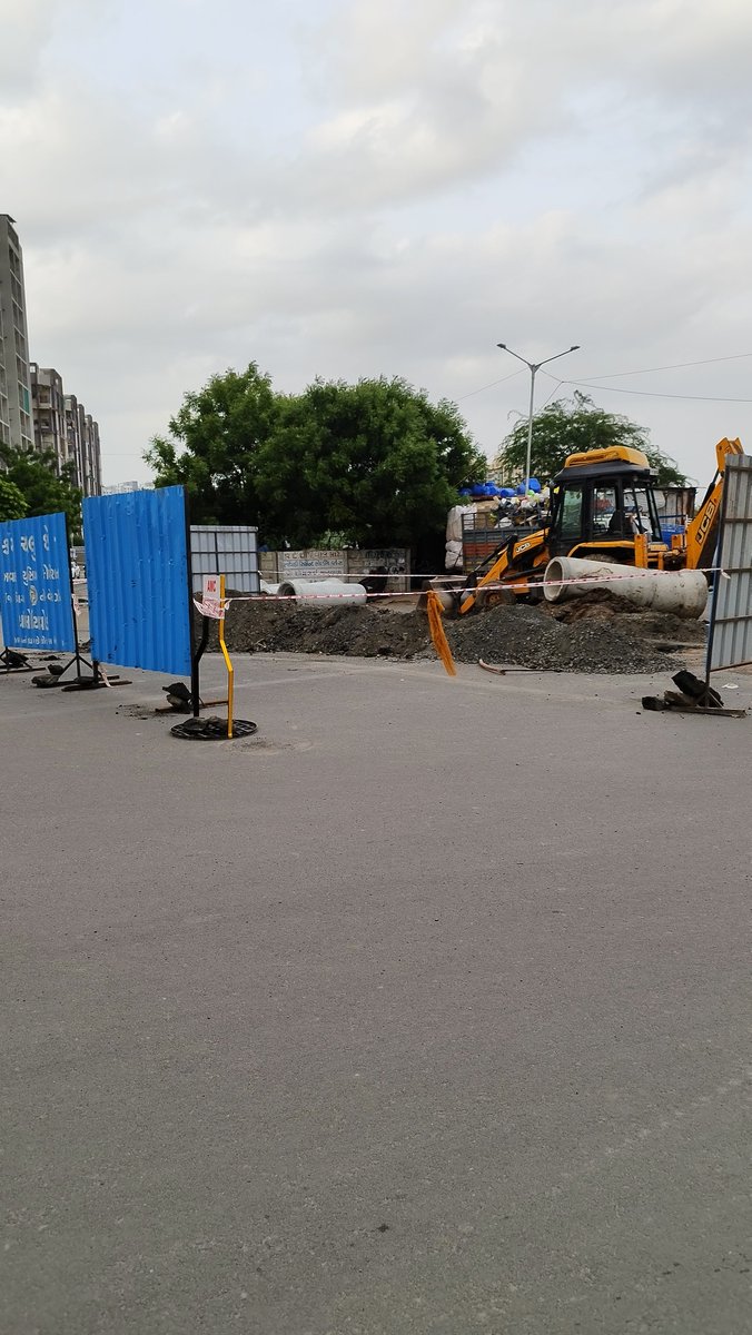 ngdarji's tweet photo. @AmdavadAMC @AMC_Complaints Just few months before the new road was made, now they realized about missing drainage link and digged, that too in monsoon. What type of road infra are you making? શરમ કરો હવે. Serenity Space, Gota. @Bhupendrapbjp @AmitShah https://t.co/Gdg49SY0kT