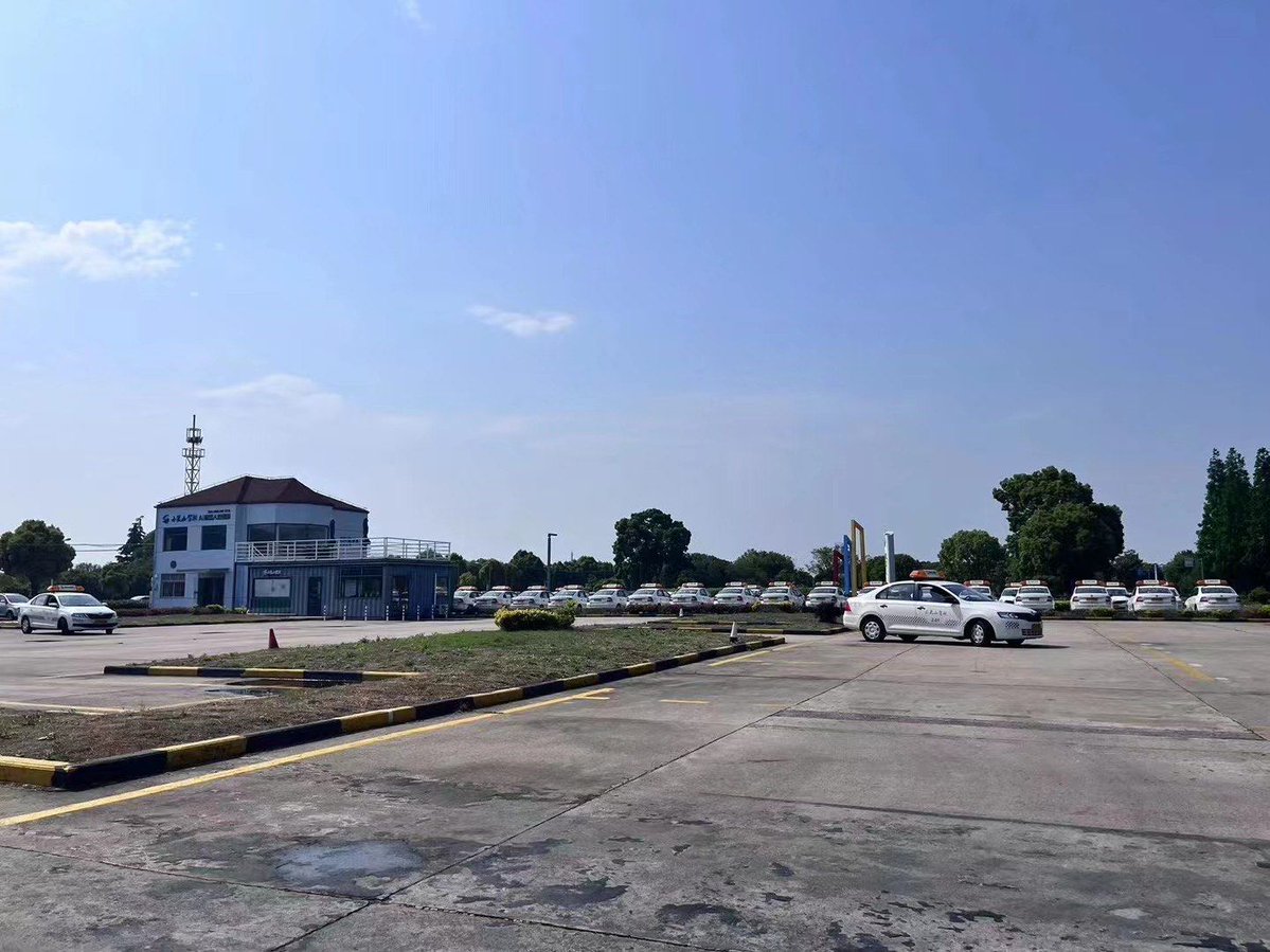 divezhang1's tweet photo. Passed my driving test on the first try after 10 hours of chaotic parallel parking practice—never thought I’d high-five my instructor over a tiny blue hatchback! https://t.co/SpDsMX05om