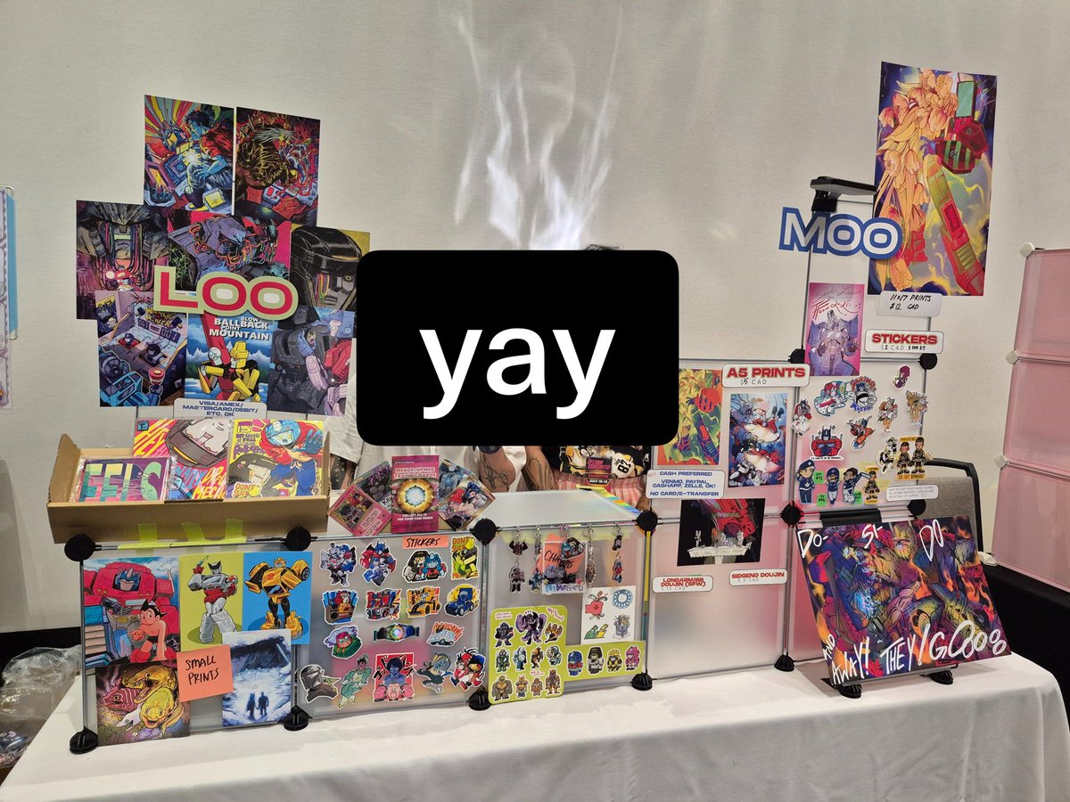 texaid_captain's tweet photo. come see me and @LUOIAE at #tfcon #tfcontoronto #maccadams #tfa we have da goodzโฆโฆโฆ i have beautiful books tooโฆ. https://t.co/Vcy1sdysjk