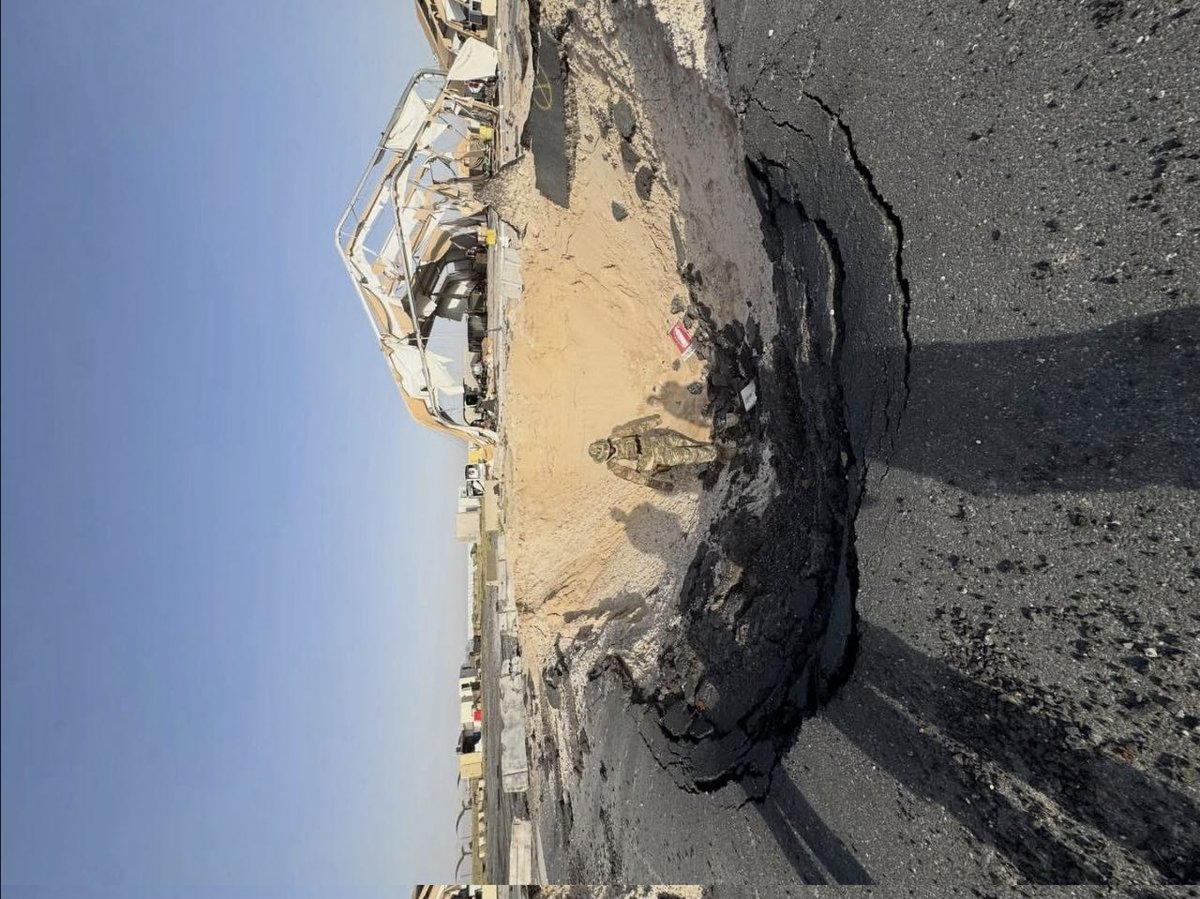 ETERNALPHYSICS's tweet photo. One of the impacts of Iran's ballistic missiles in Jordan, which is old and dates back to June or earlier during the 40-day war. In any case, it can be seen that the blast wave has blown away at least two hangars; the impact accuracy is also acceptable given the distance. 1/2 https://t.co/ohM8bqrpZT