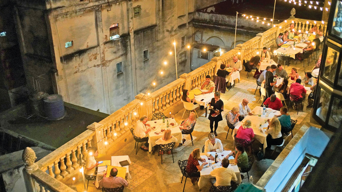 Openthemag's tweet photo. Private restaurants, the paladares, began in living rooms and gardens, whatever the family could cook, usually delicious. Castro watched these entrepreneurships as he understood that every private table was a philosophical challenge to his revolution, writes @carlopizzati https://t.co/vyBT1g0YzF