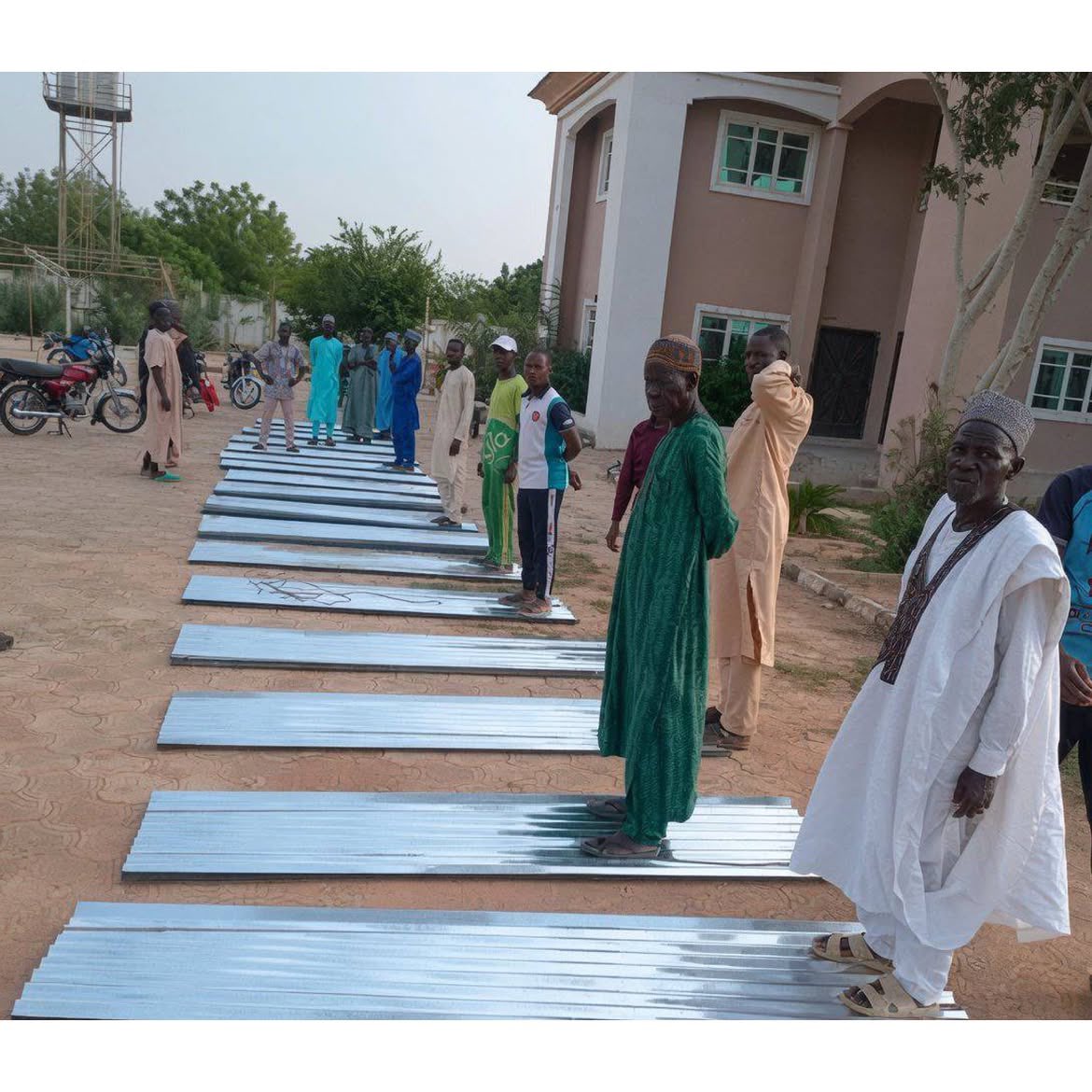 instablog9ja's tweet photo. Jigawa LG Chairman Sparks Reactions as Residents Receive One Roofing Sheet Each in Empowerment Scheme https://t.co/0PX42sCLML