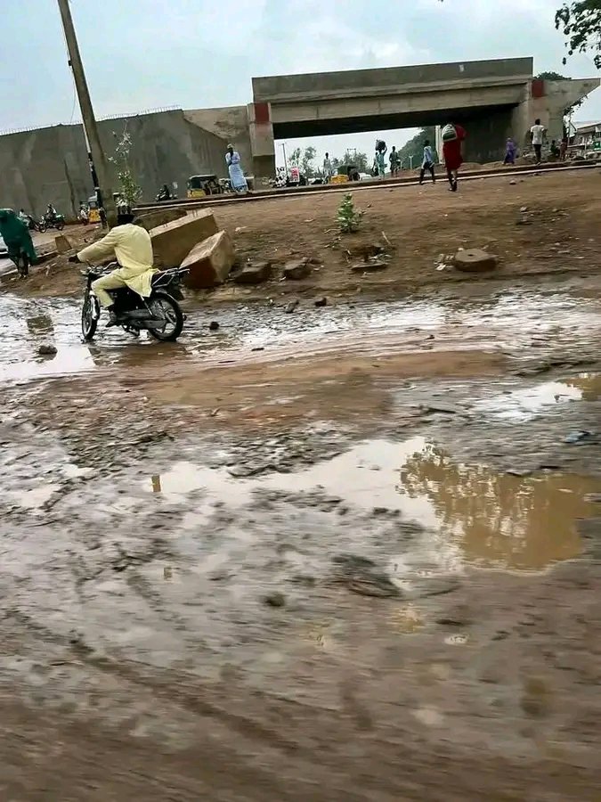 aliyuwali220's tweet photo. UBA SANI PROMOTERS, PLEASE TELL US WHAT IS THE DIRECTION OF THIS GOVERNMENT? WE ARE DEEPLY CONCERNED AND HEARTBROKEN

Those of you promoting Uba Sani, we beg you come out and sincerely tell us Where is the direction of this government?
 We are genuinely confused, worried, and our hearts are heavy with pain over what has become of our dear state.

The only work this administration shows is on social media  fancy videos and propaganda. Nothing real on the ground.Just taje a Look at the unfinished bridge in Kofan Doka, Zaria  every rainfall turns it into a dangerous river, putting our brothers and sisters at serious risk. Even worse, the Agwaro claimed the precious life of an innocent young girl. How many more lives must we lose because of this negligence?

 This is heartbreaking and unacceptable.
We are deeply concerned as investors are fleeing Kaduna daily, businesses are shutting down, and our economy is collapsing. Our people are suffering terribly. We are being consumed every single day by shocking incompetence, while insecurity continues to terrorize our communities.

We once had a governor who actually governed who cared, delivered visible projects, and gave us hope. But today under Uba Sani, it feels like the state has been abandoned. Our children’s futures are being destroyed. Our safety is gone. Our hope is fading.

This pains us greatly. We cannot continue like this. The suffering is too much. The negligence is too painful to watch.

His administration has failed us woefully. No direction. No care. No results  only social media deception. We are crying out for change because we love Kaduna and we deserve far better.

2027 will surely come, and we will use all constitutional means available to vote out this administration InshaAllah. this failed leadership.

The time to rescue our state is now! 

#UbaSaniMustGo
#KadunaDeservesBetter
#RescueKaduna
#VoteThemOut2027