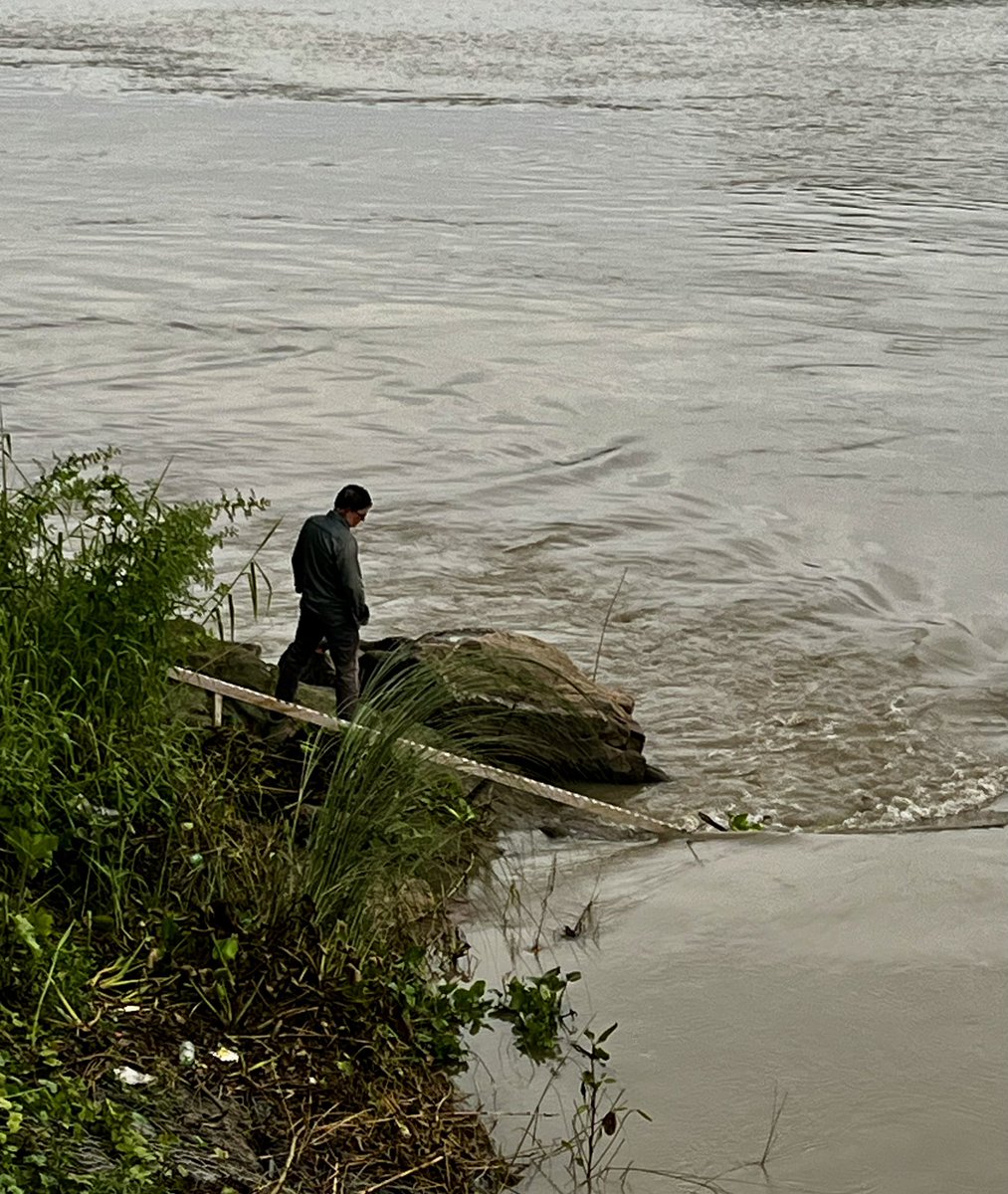 mrinaltalukdar8's tweet photo. Every dawn, before the world awakens, he reads the pulse of the Brahmaputra—measuring not just the river’s rise, but the hopes and fears of those who live by its banks.- The Sentinel of the Brahmaputra. https://t.co/JMRn1VS2L9