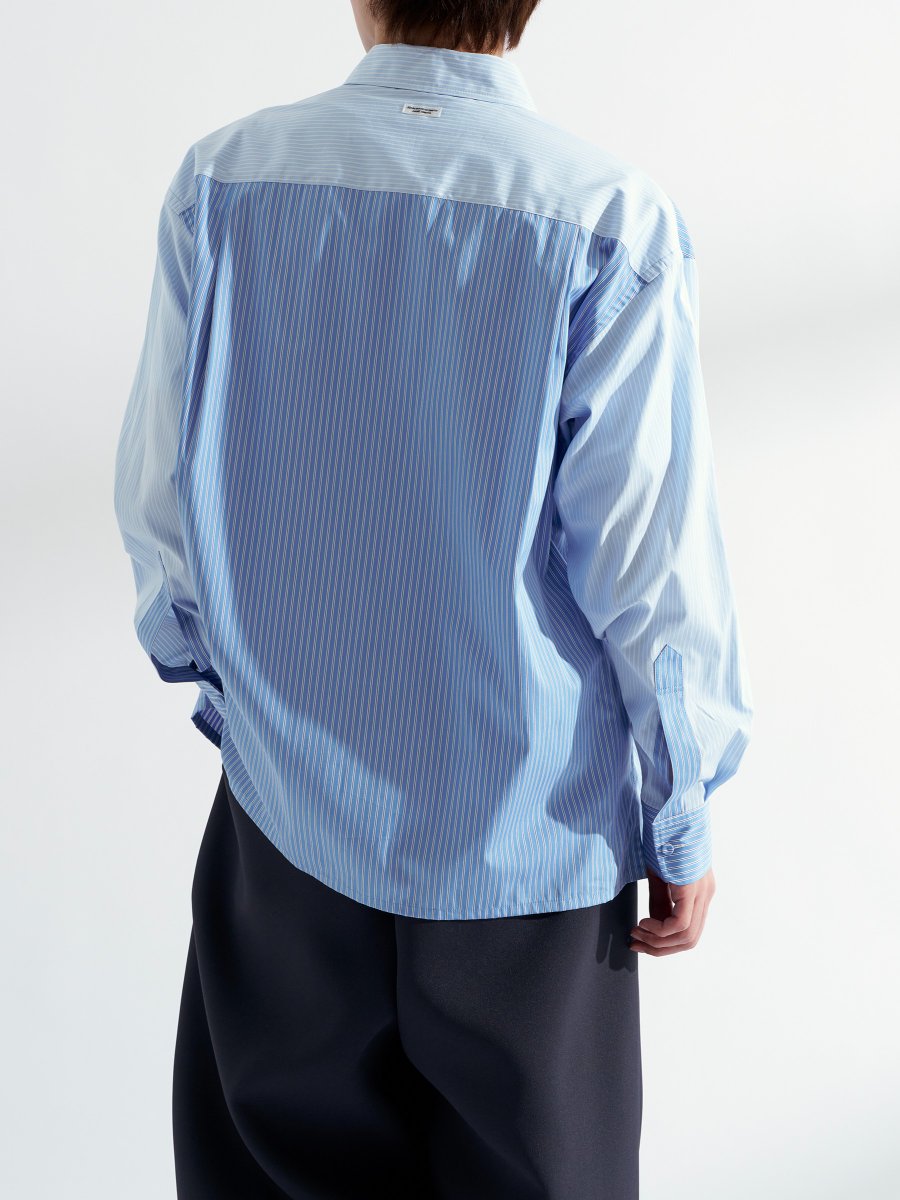 FashionsnapBuy's tweet photo. 【40％OFF】「ジョンメイソンスミス」の巧みな切り替えが目を惹くストライプシャツが主役。トラッドに傾きがちなストライプ柄を、「ヨシオクボ」のネイビーのスーパーワイドパンツを合わせた同系色のワントーンでまとめることで、こなれ感のあるモダンな夏の着こなしへと昇華しています。 https://t.co/phwA8SMx5P
