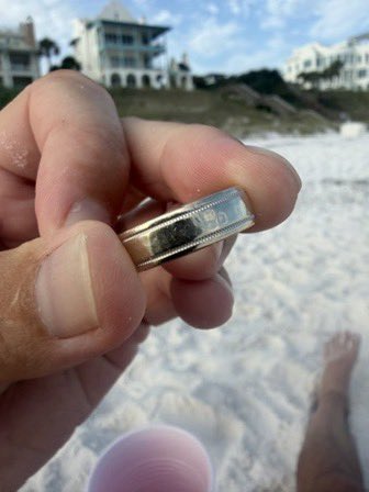 Ummietaa's tweet photo. A kid randomly dug his hand into the sand at Seagrove Beach, Florida and pulled out a wedding band engraved:

“April 16, 2016. I love you.”

Someone has been missing this ring for years. Internet, do your thing and help us find her. ❤️ https://t.co/SwZIO5JC65