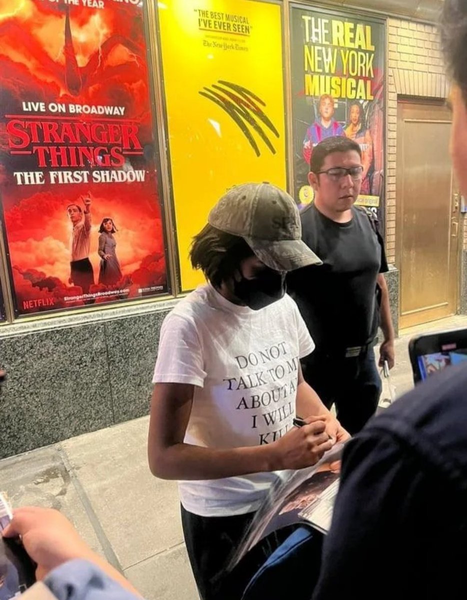 LazarusLong13's tweet photo. Ayo Edebiri from "The Bear", quite smartly wearing a KN95 in order to sign autographs. https://t.co/eG97AS49Gt