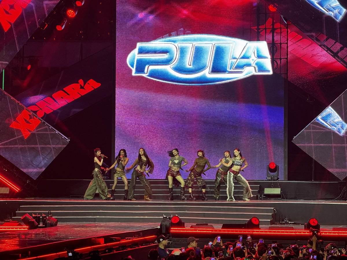 Puregold_PH's tweet photo. The Big Dome turned red with @officialxonara’s latest single Pula! 

#PuregoldOPMConGenerations2026 #AlwaysPanalo https://t.co/5858nKFr6d