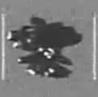 DrEliDavid's tweet photo. Left: Snapshot from the new "UFO" video released by the White House

Right: Same snapshot enhanced with AI https://t.co/LD37naeNGK