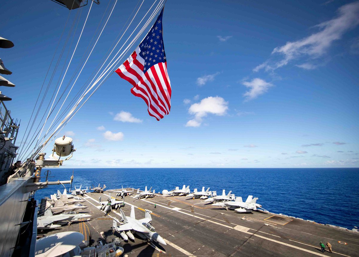 GW_CVN73's tweet photo. Good morning, America — you are worth defending! 🇺🇸

From the flight deck of the USS George Washington (CVN-73), our flag flies high over the Pacific. 

Forward-deployed and ready — 5,000+ Sailors standing the watch. 

We’re here. We’re ready. 

📸 MC3 Souza https://t.co/8OeJAeY5G3