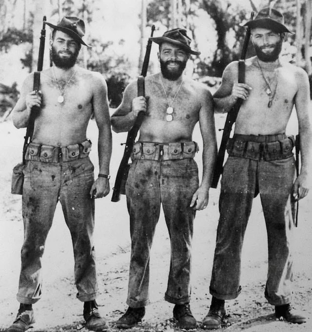 wars's tweet photo. Three Madden brothers -- USMC. L to R: Albert, Walter and John. Served with VMO-251 (photo recon, equipped with F4F-3P Wildcat). Taken July 8, 1943 on their last day on Guadalcanal before returning to California. https://t.co/P1cpMdbaBE
