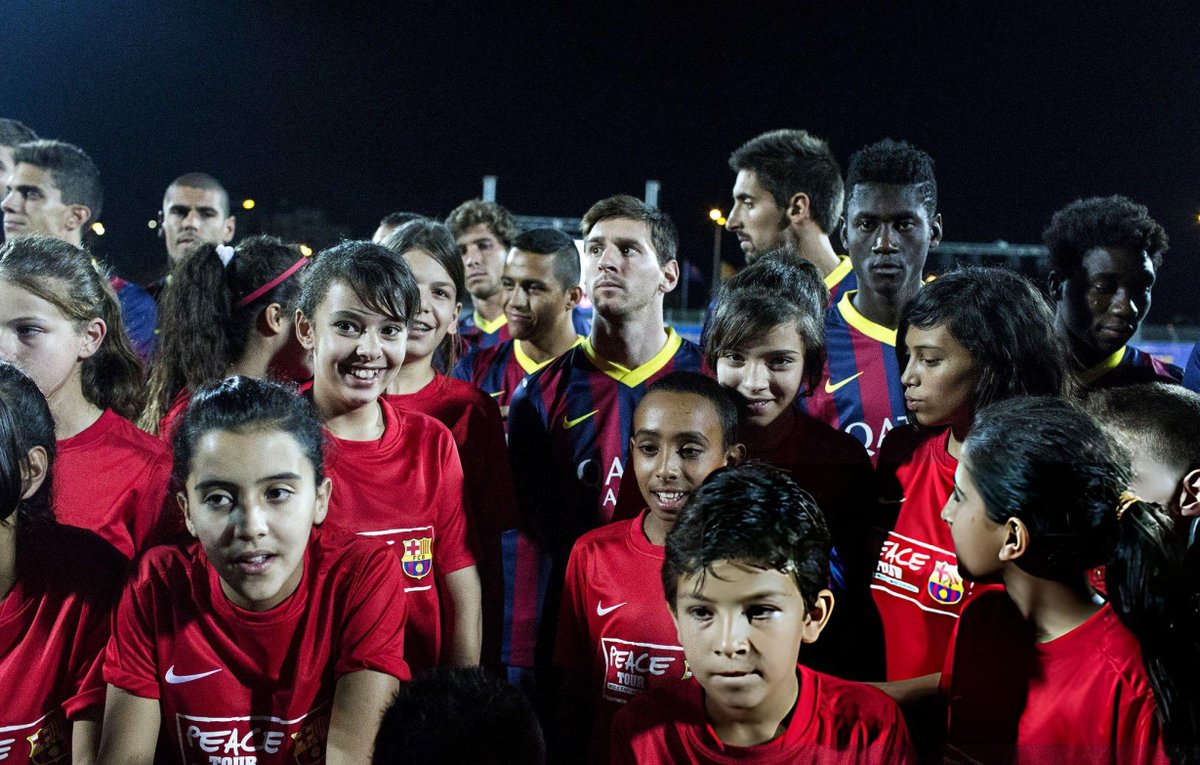 KurdishFT's tweet photo. Lionel Messi with Palestinian children at a youth football camp held August 3, 2013, at Dura Stadium in West Bank https://t.co/vOhZ51hfno