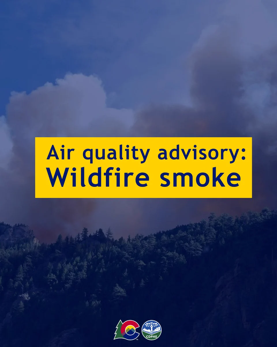 Wildfire smoke in the sky over a ridge. Text on image reads, "Air Quality Advisory: Wildfire Smoke." CDPHE logo at the bottom.