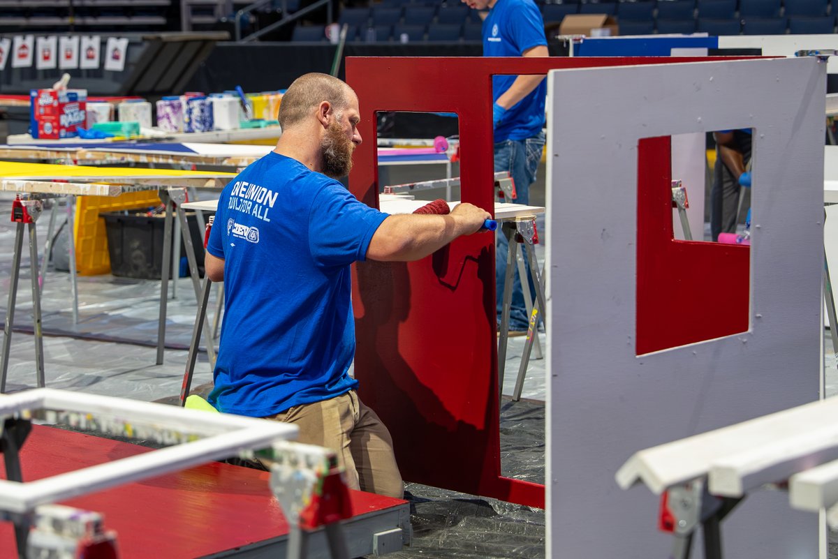 BlueJacketsNHL's tweet photo. Our @HabitatMidOhio Playhouse Project Build Day is officially underway!

With over 75 amazing @cmwcarpenters volunteers, 10 custom designs and a LOT of paint, we’re kicking off a really special day on our arena floor 🤩 https://t.co/KsmSRh9OPc
