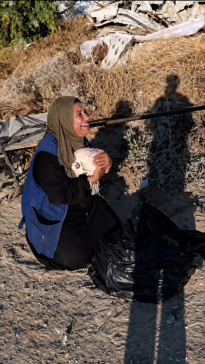 abod_bt's tweet photo. Israel killed her son and deprived her of the chance to say goodbye to him. After weeks of waiting, the only way she could hold him again was in the form of his remains, embracing him one last time before his final farewell. https://t.co/XyQ0cyLzdg