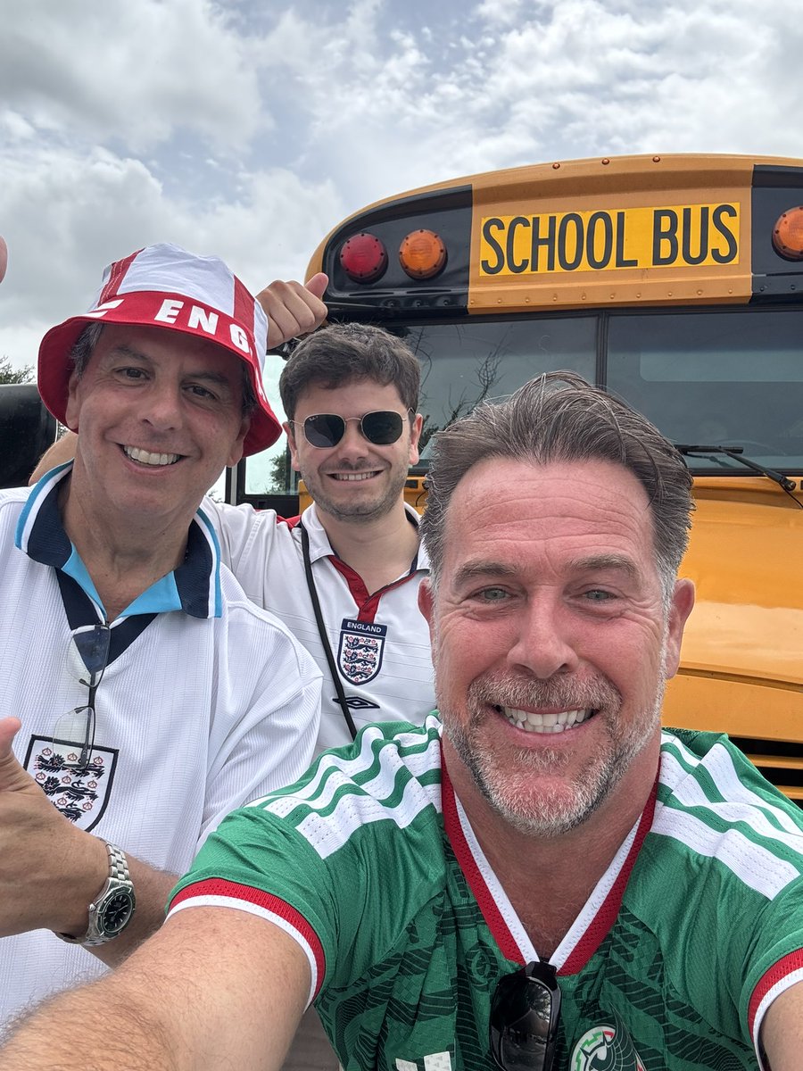 TheBrightonBard's tweet photo. I’M ON A SCHOOL BUS 🚌

(And I’m tempted to have a cheeky smoke on the back seat ☺️) 

What a great idea. Using fleets of the classic American school bus to ship us all to the stadium from various parts of the city.

This is SO well organised. 

Flawless! 

(But it’s sweltering!) https://t.co/ET4FEK1zCF