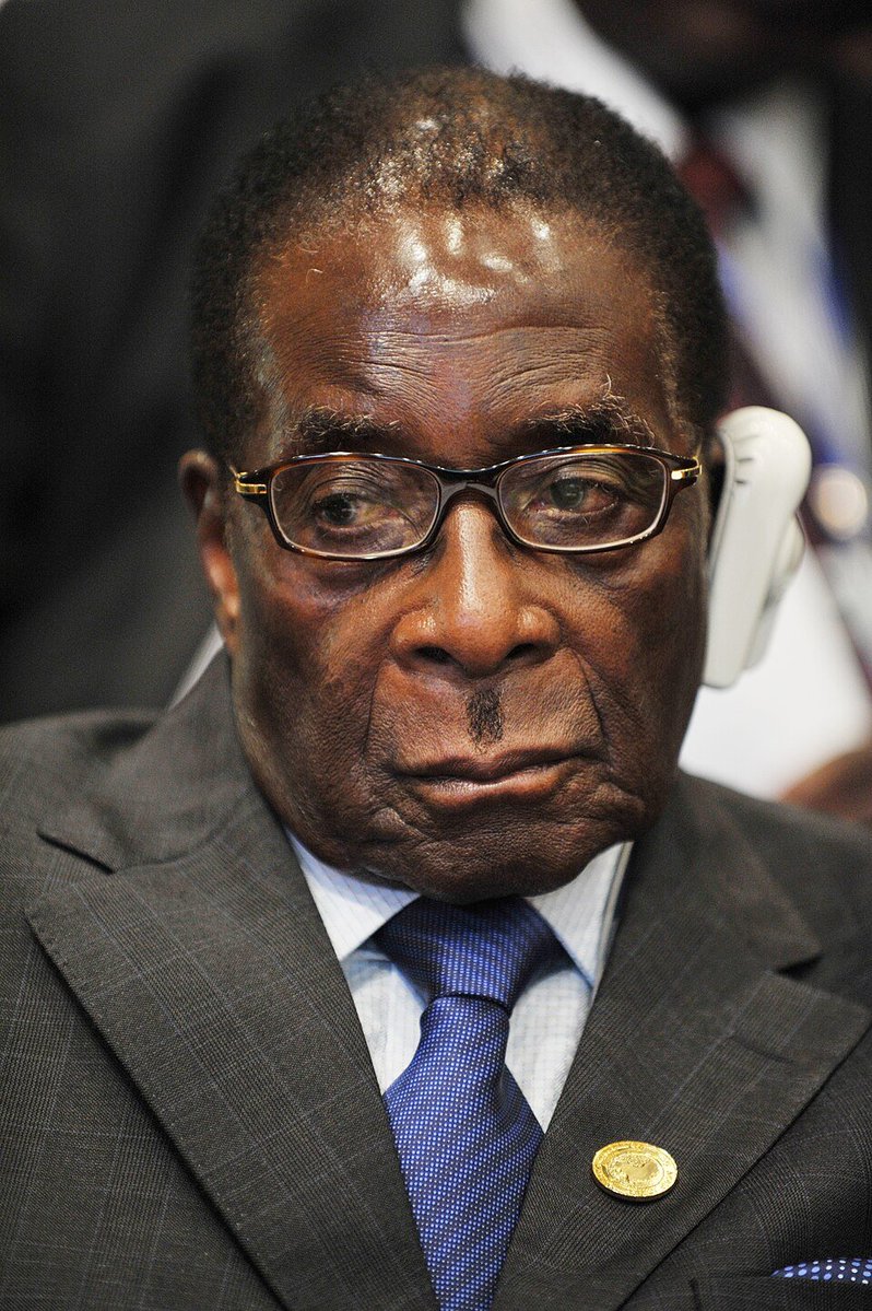 CucsmanE's tweet photo. This man destroyed Zimbabwe. He not only destroyed our country, but he also destroyed the mentality of Zimbabweans. Many Zimbabweans haven't recovered from the trauma of seeing their fathers being killed or beaten, and their mothers being raped or tortured just for being opposition members. Many are still afraid of opposing the government openly even when it is justified to do so let alone demonstrating,may his soul rot in hell , fucken idiot 🚮