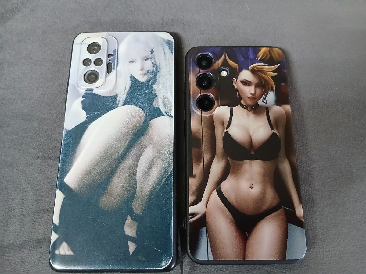 MurakumoJP's tweet photo. Since 2023, I used a Redmi Note 10 Pro with 3D art by
@7GraphicsNSFW . For my new Samsung S25, I chose
@therealzOh's Akali art—couldn't resist printing it on a case! Sorry, @therealzOh , for not asking first (your Boosty was blocked), but I hope you don't mind! https://t.co/NRQLWKtk52