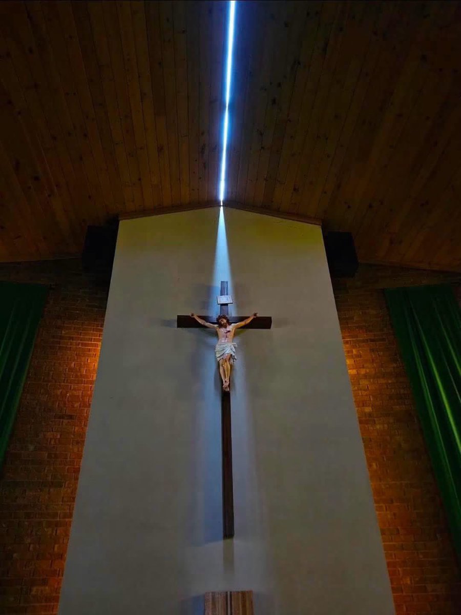 MattDevittWX's tweet photo. One of the most incredible storm damage pictures I’ve ever seen happened this morning in South Dakota. A 131 mph wind gust in the city of Highmore split the roof of the Catholic Church perfectly illuminating the crucifix. This is not AI, it’s been confirmed real by locals. Truly amazing. Credit: Joseph Mat @stormhour